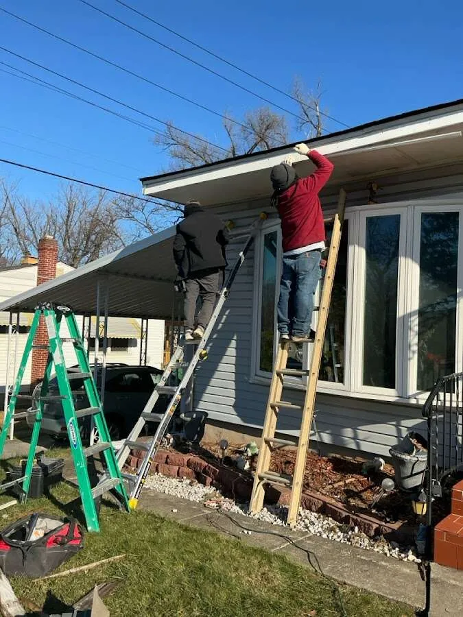 Restoration crew performing exterior repair in Kalispell